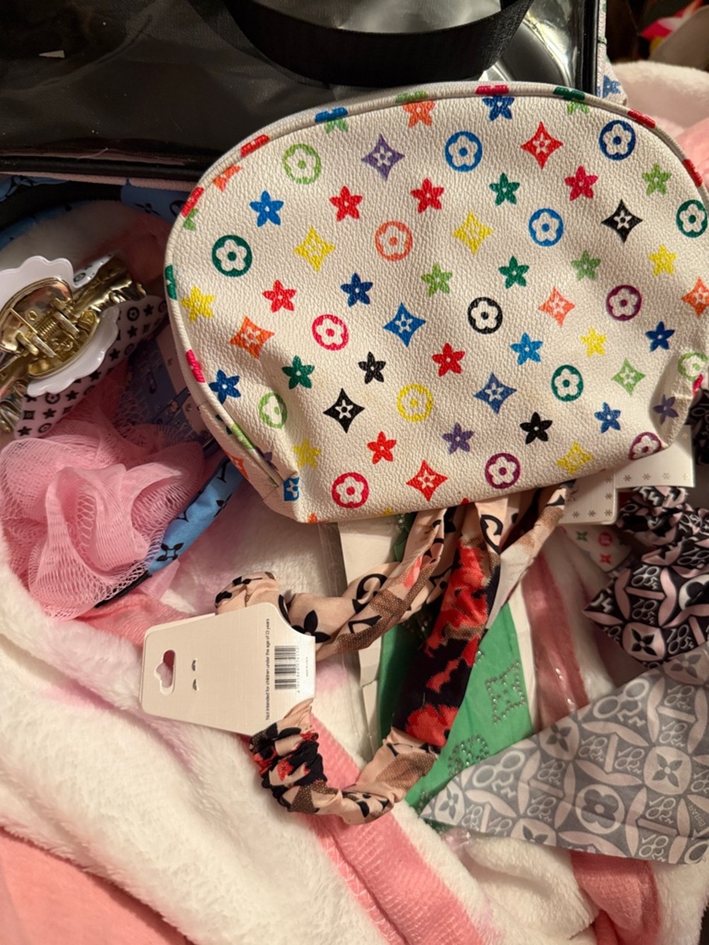 Multicolor Patterned Cosmetic Pouch - White filled to the brim
